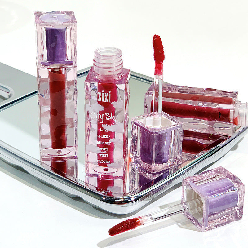Xixi Cotton Cloud Lip Glaze: High-Shine Water Gloss Finish