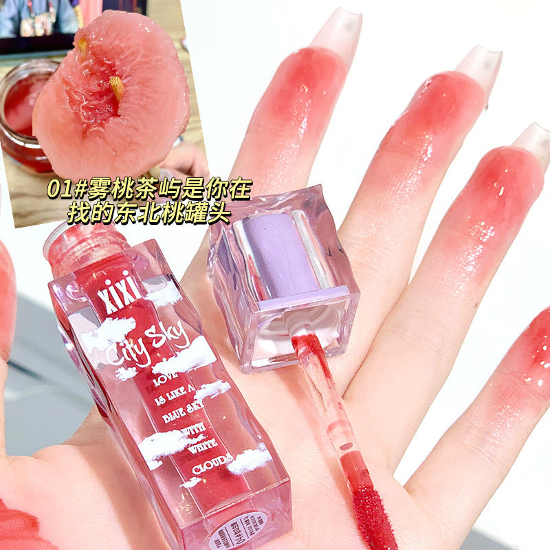Xixi Cotton Cloud Lip Glaze: High-Shine Water Gloss Finish
