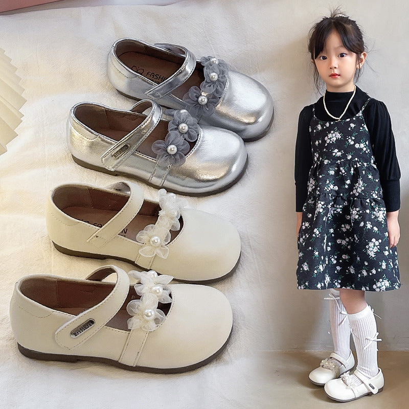 White kids athletic shoes with lightweight and breathable design for active wear