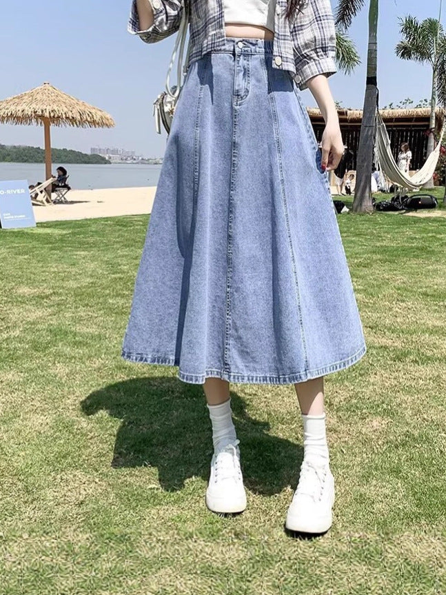 Light blue plus size high-waisted elastic waist a-line denim midi skirt for women