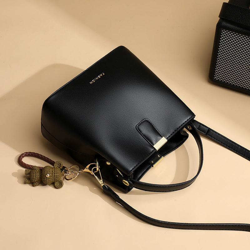 Brown textured small bucket crossbody bag for women