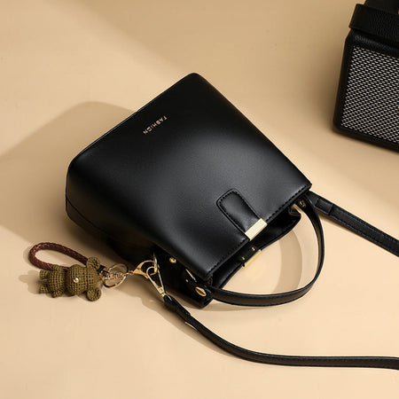 Brown textured small bucket crossbody bag for women