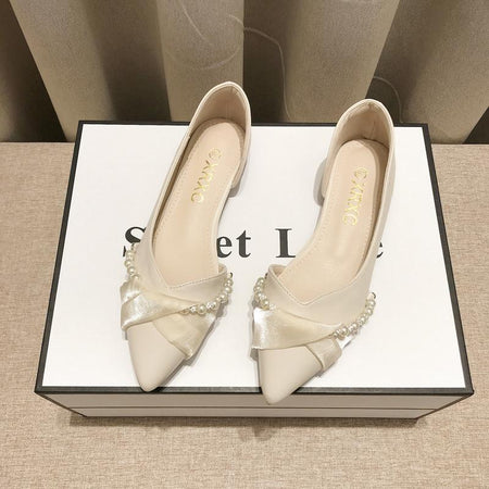 Black chanel-inspired pointed toe pearl slip-on shoes