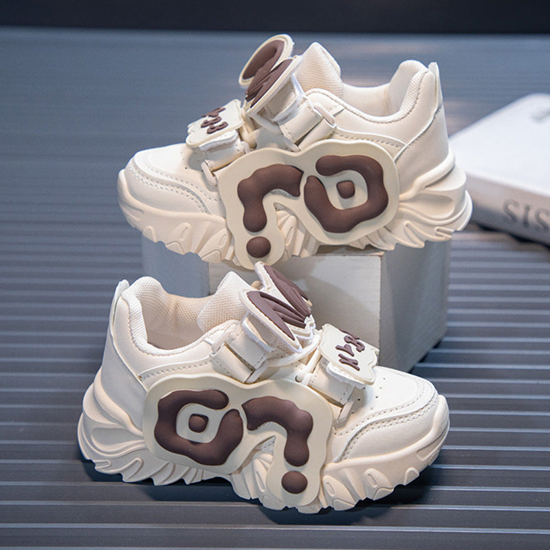 Beige kids athletic shoes with lightweight and breathable design for active wear