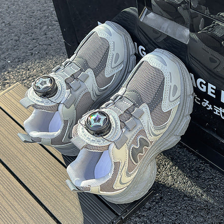 Gray kids athletic shoes with lightweight and breathable design for active wear