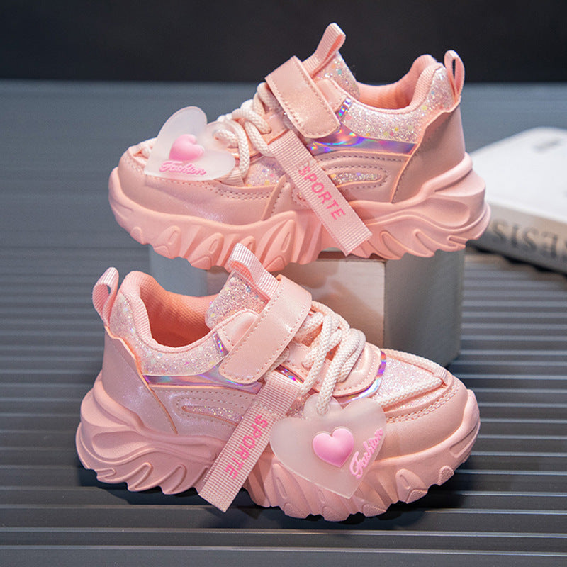 Pink kids athletic shoes with lightweight and breathable design for active wear
