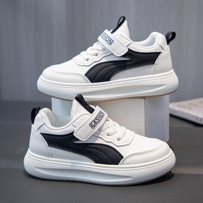 Black kids athletic shoes with lightweight and breathable design for active wear