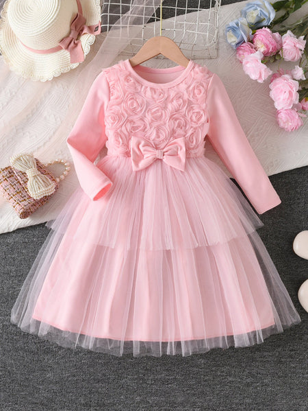 Girls pink back bow princess mid-length summer dress with flowing silhouette