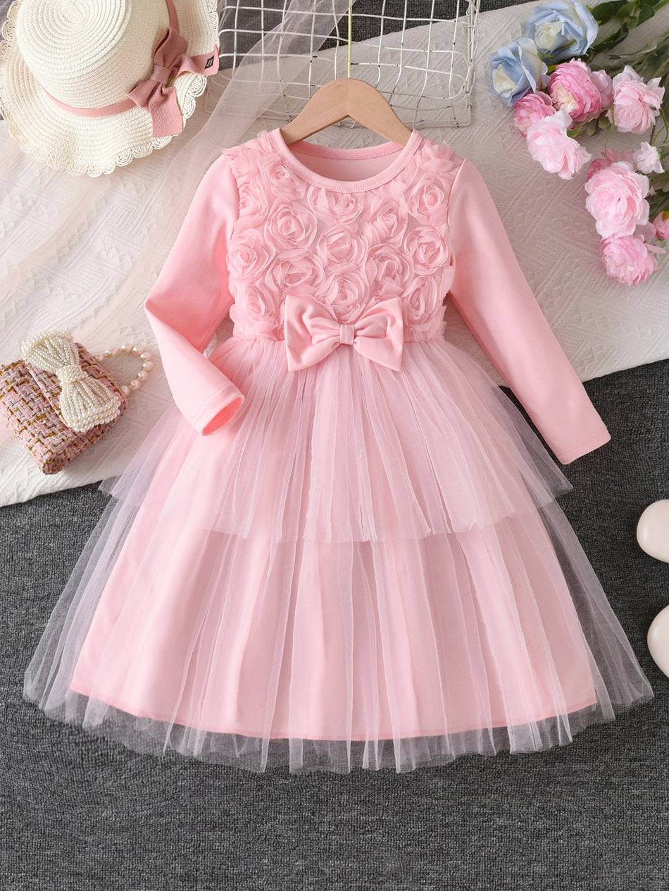 Girls pink back bow princess mid-length summer dress with flowing silhouette