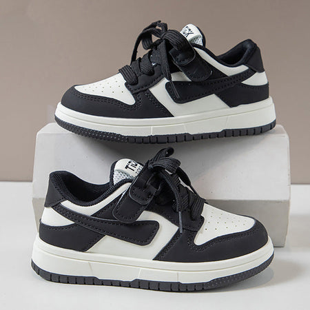 Black kids athletic shoes with lightweight and breathable design for active wear
