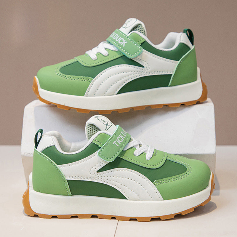 Green kids athletic shoes with lightweight and breathable design for active wear