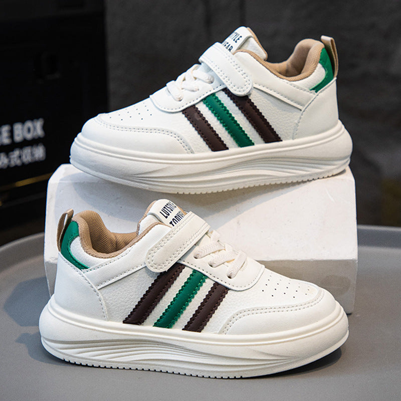 Green kids athletic shoes with lightweight and breathable design for active wear