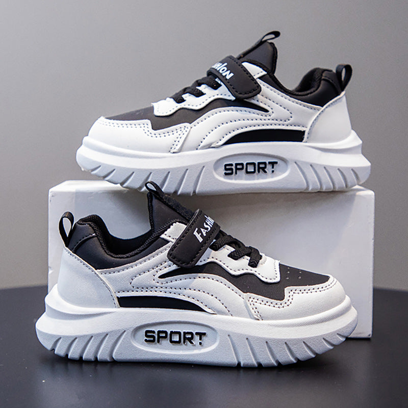 Black kids athletic shoes with lightweight and breathable design for active wear