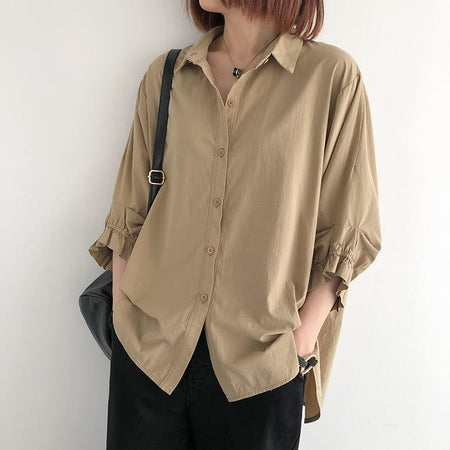 White graceful lantern sleeve blouse in breathable summer crepe