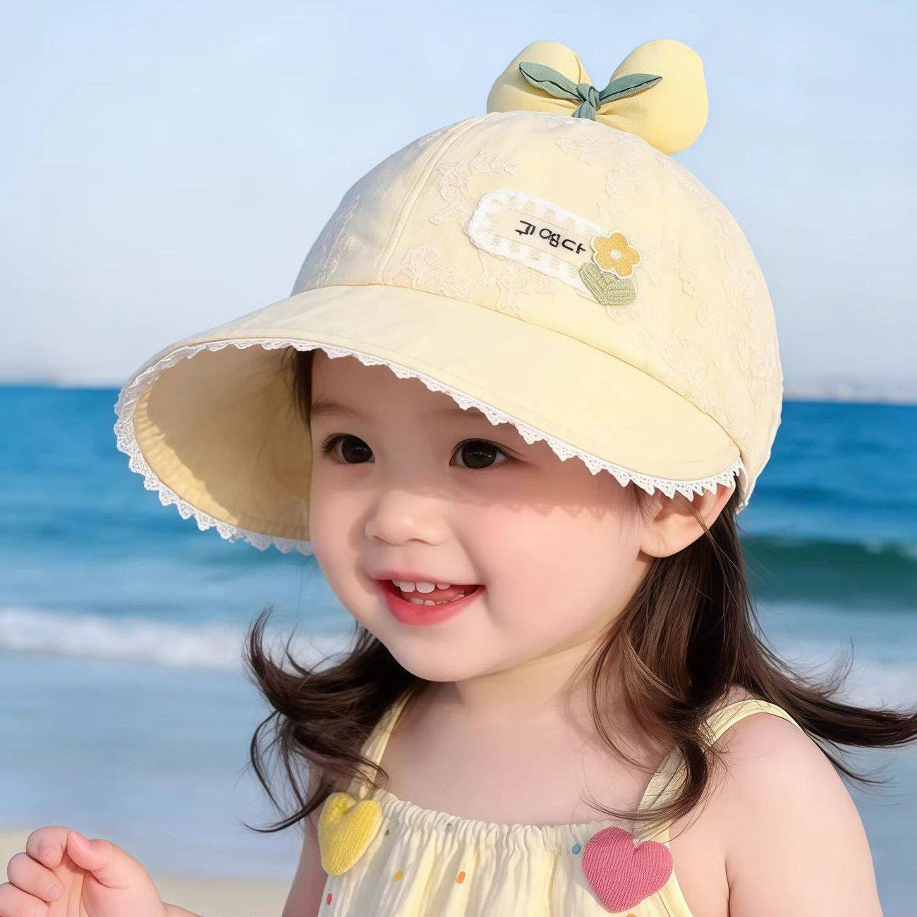 Green kids sun hat with breathable design for outdoor summer and beach wear