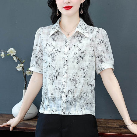 Black floral chiffon short-sleeve blouse in fluid relaxed fit