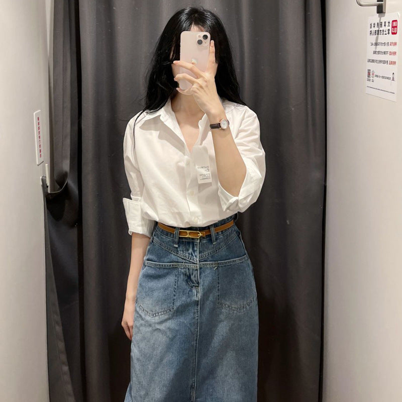 White sculpted long-sleeve minimalist blouse in pristine white