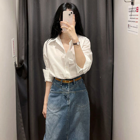 White sculpted long-sleeve minimalist blouse in pristine white