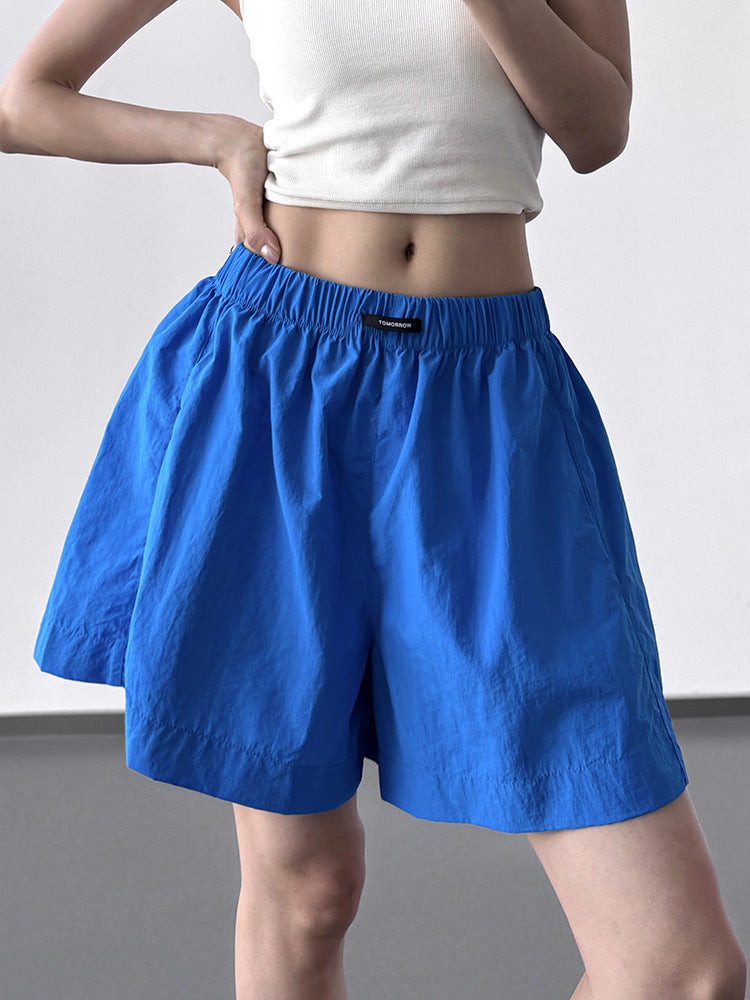 Pink high-waisted a-line quick-dry shorts in azure blue