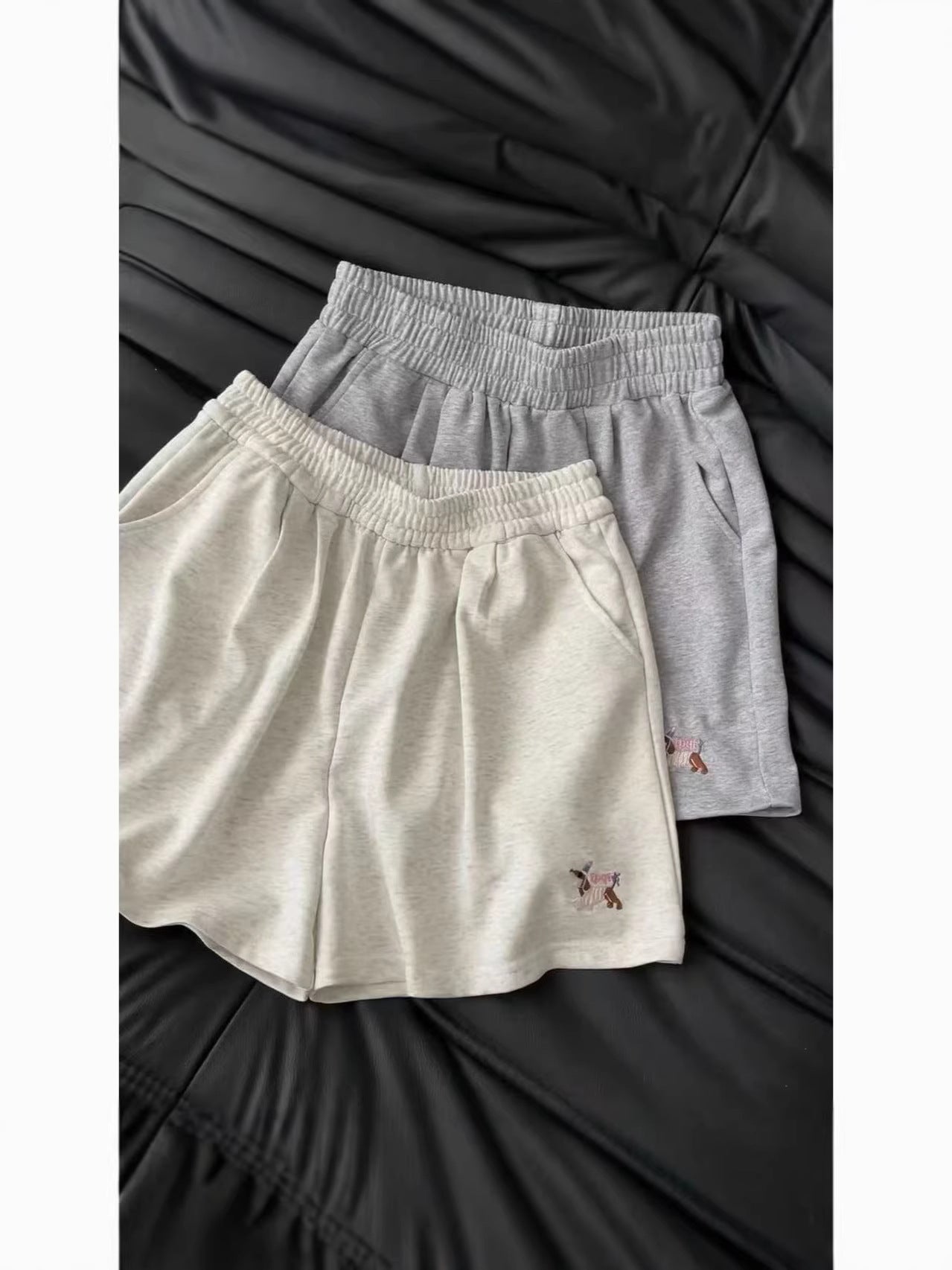 Off-white high-waisted relaxed wide-leg athletic shorts