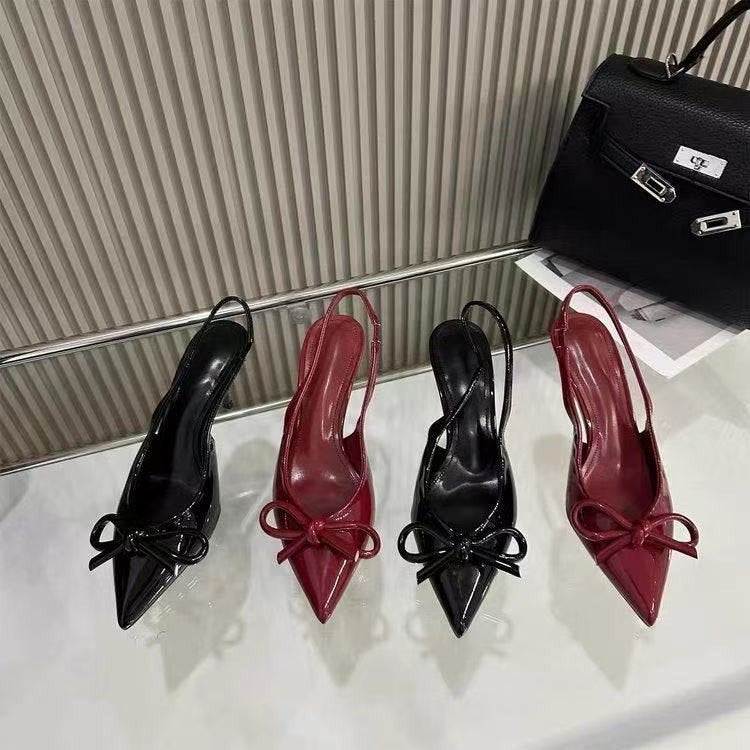 Bow-Detailed Pointed Toe Pumps in Crimson Patent Leather