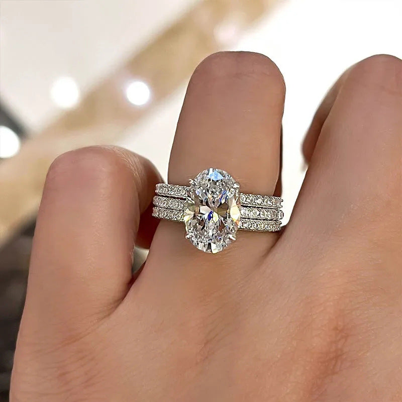 Three-Set Oval Zircon Full Diamond Engagement Ring