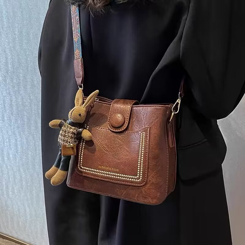 Women's Retro PU Bucket Bag with Stitching and Pendant