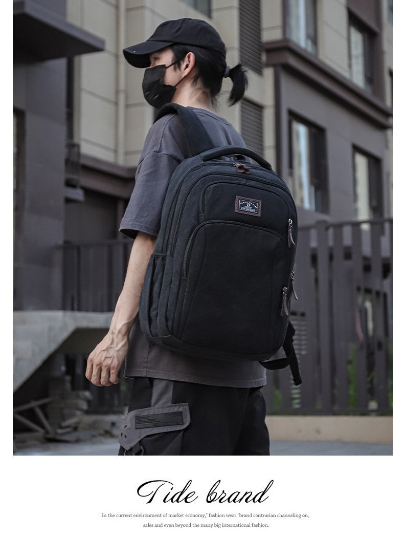 Men's Outdoor Waterproof Canvas Laptop Travel Backpack