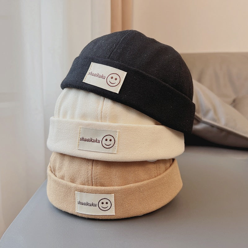 Kids’ Brimless Smiley Hat – Trendy Pumpkin Beret