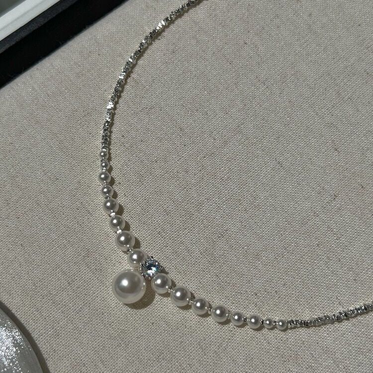 STOCK-Shijia Pearl Necklace – Elegant Silver Whisper