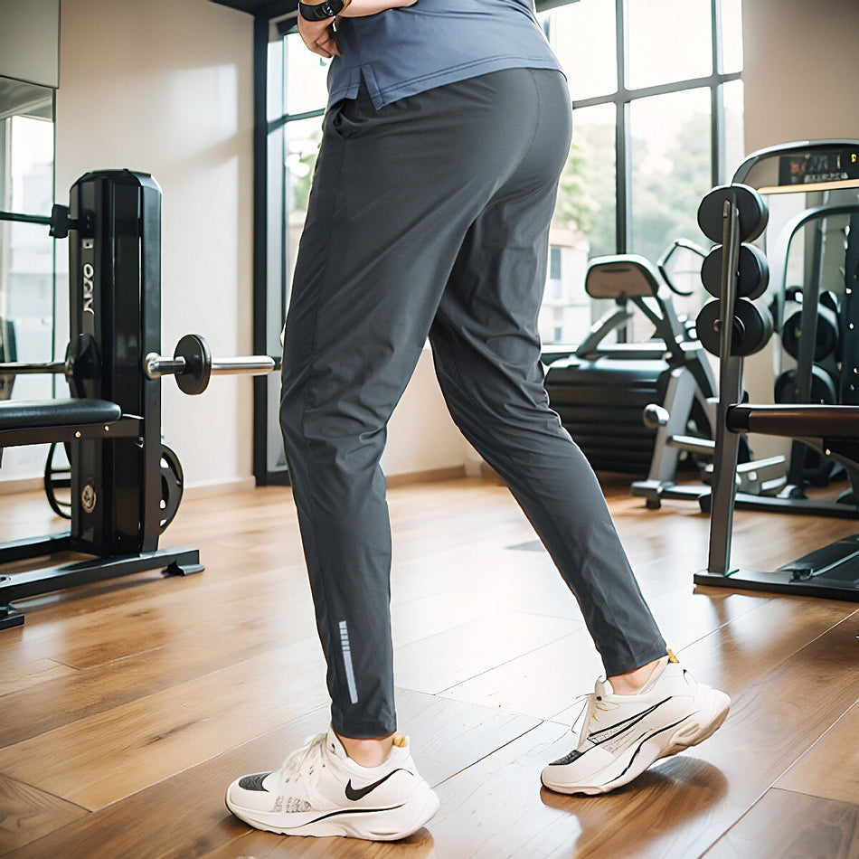 Men's Slim Fit Sports Pants – Elastic Waist & Nine-Point Design