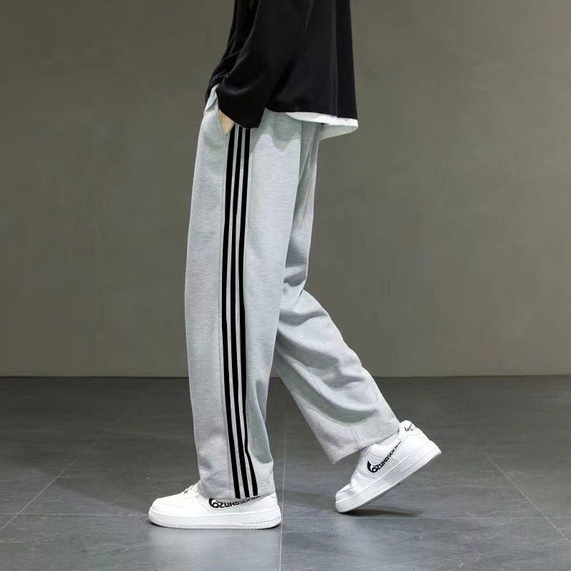 INSTOCK-Yitingxuan Three-Bar Sports Trousers – Stylish &