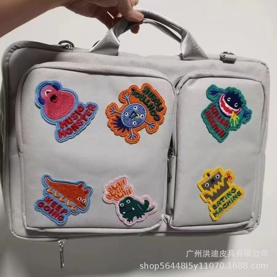 Monster Patch Laptop Bag – Stylish 16 Inch Diagonal Satchel